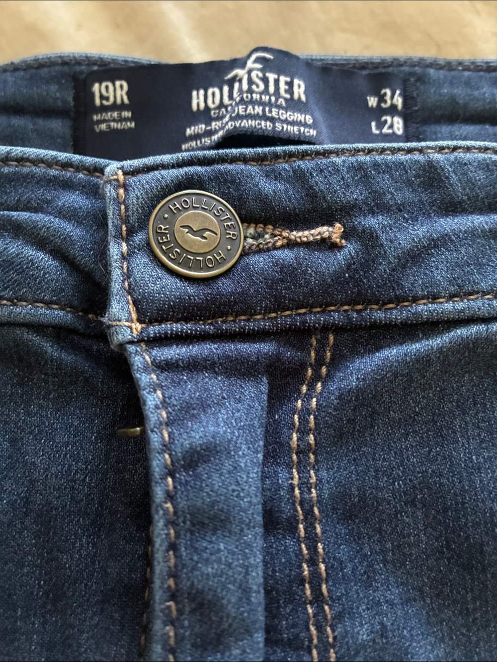 Hollister Dark Indigo Mid-Rise Jean Legging with Branded Button